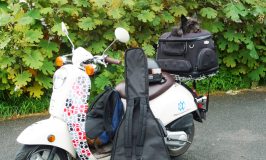 motorcycle dog and guitar in the parking lot of Shelburne Falls Coffee Roasters