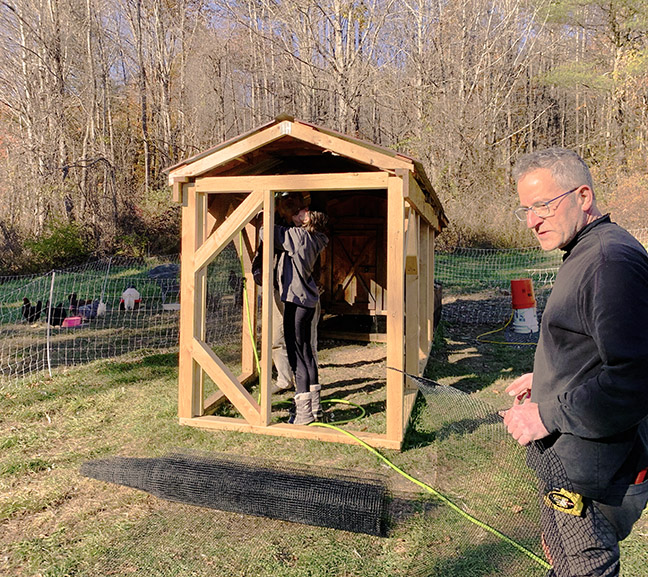 the Stowe Farm Laying Chicken Club worked on closing in a chicken run that will allow our ladies covered outside access during the coming snows.